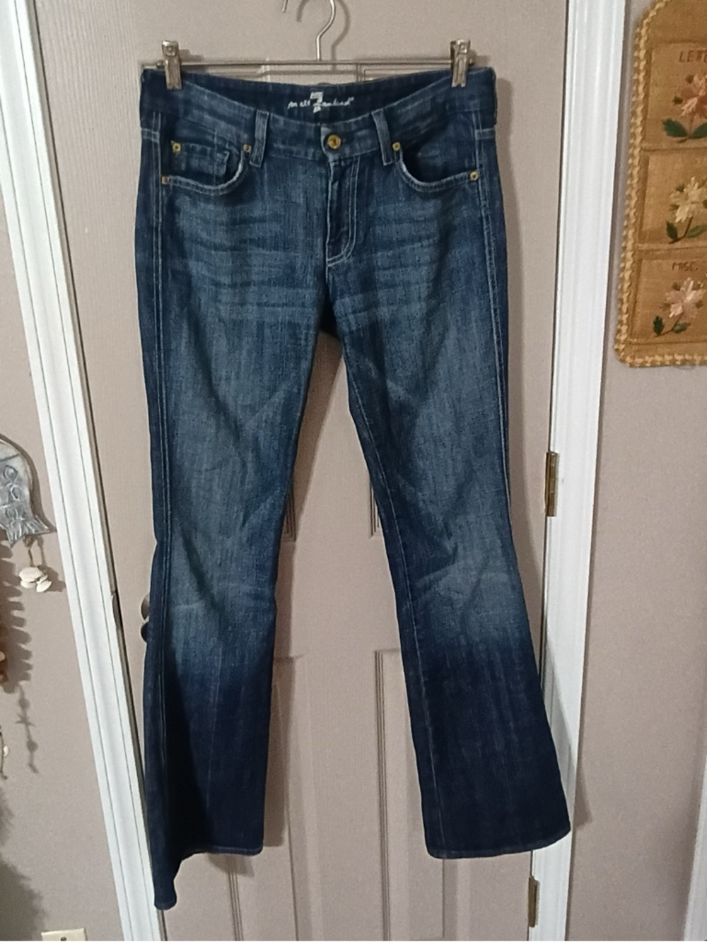 7 For All Mankind vintage low rise flare medium/dark wash A jeans. Size 28.